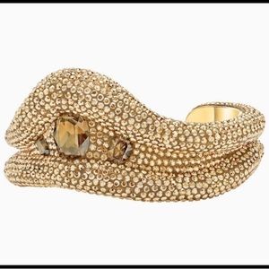 Atelier Swarovski Tigris Cuff in Gold-Tone Plated. Comes with box.